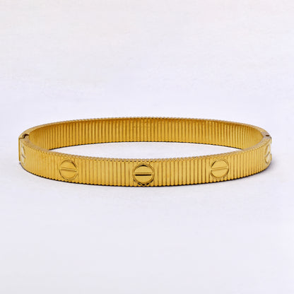 SSYB7210 - Steel 60mm x 50 mm x 7mm textured oval hinged bangle
