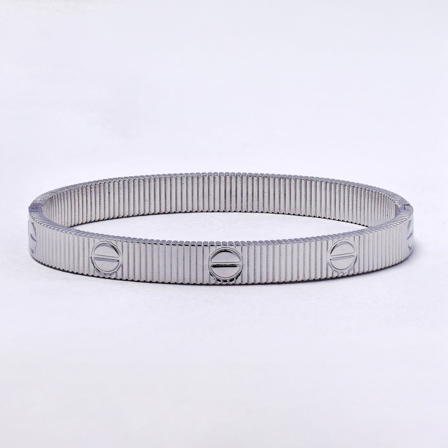 SSYB7210 - Steel 60mm x 50 mm x 7mm textured oval hinged bangle