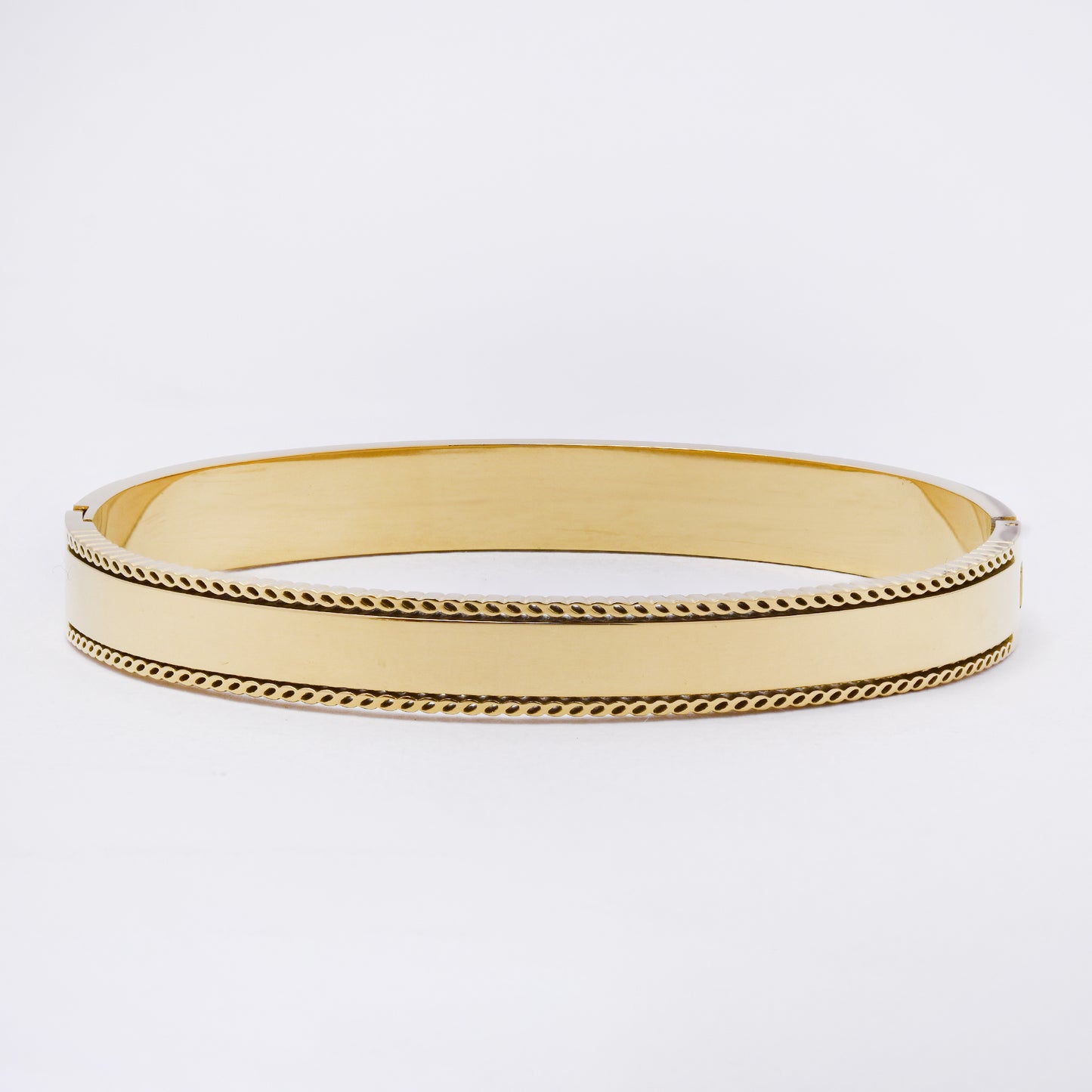 SSYB7263 - Steel 62mm x 49mm x 7.5mm textured edge hinged bangle