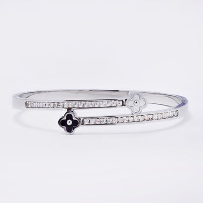 SSYB7268 - Steel 59mm x 51mm x 14mm clover and CZ hinged bangle