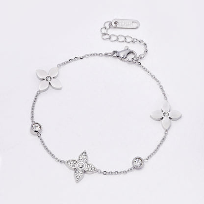 SSYB7279 - Steel 16cm + 4cm CZ flower bracelet