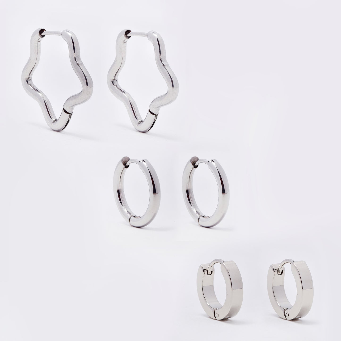 Stainless steel 3 pack gold 3x13mm huggie and 2.5x17mm sleeper and 23mm star hoop earrings - SSYE5524