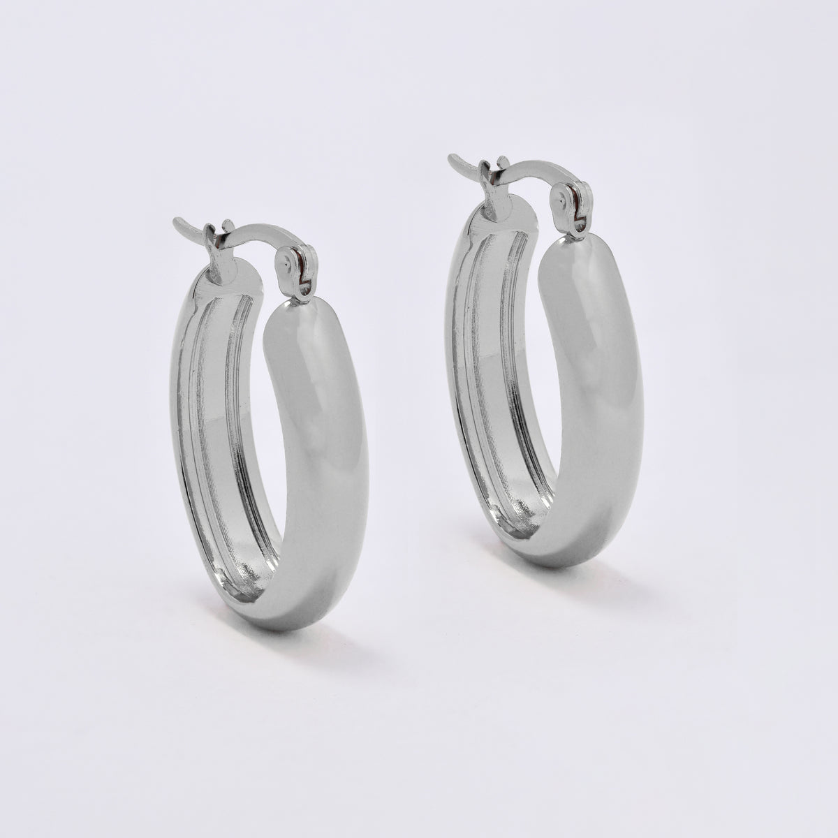 SSYE6811 - Steel 29mm x 20mm x 6mm oval hoop earring