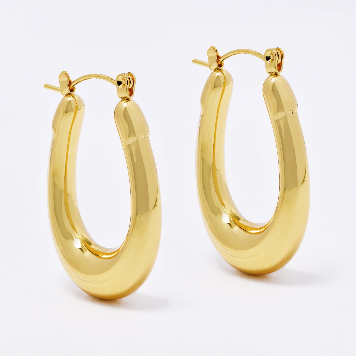 SSYE7100 - Steel 38mm x 7mm oval hoop earrings
