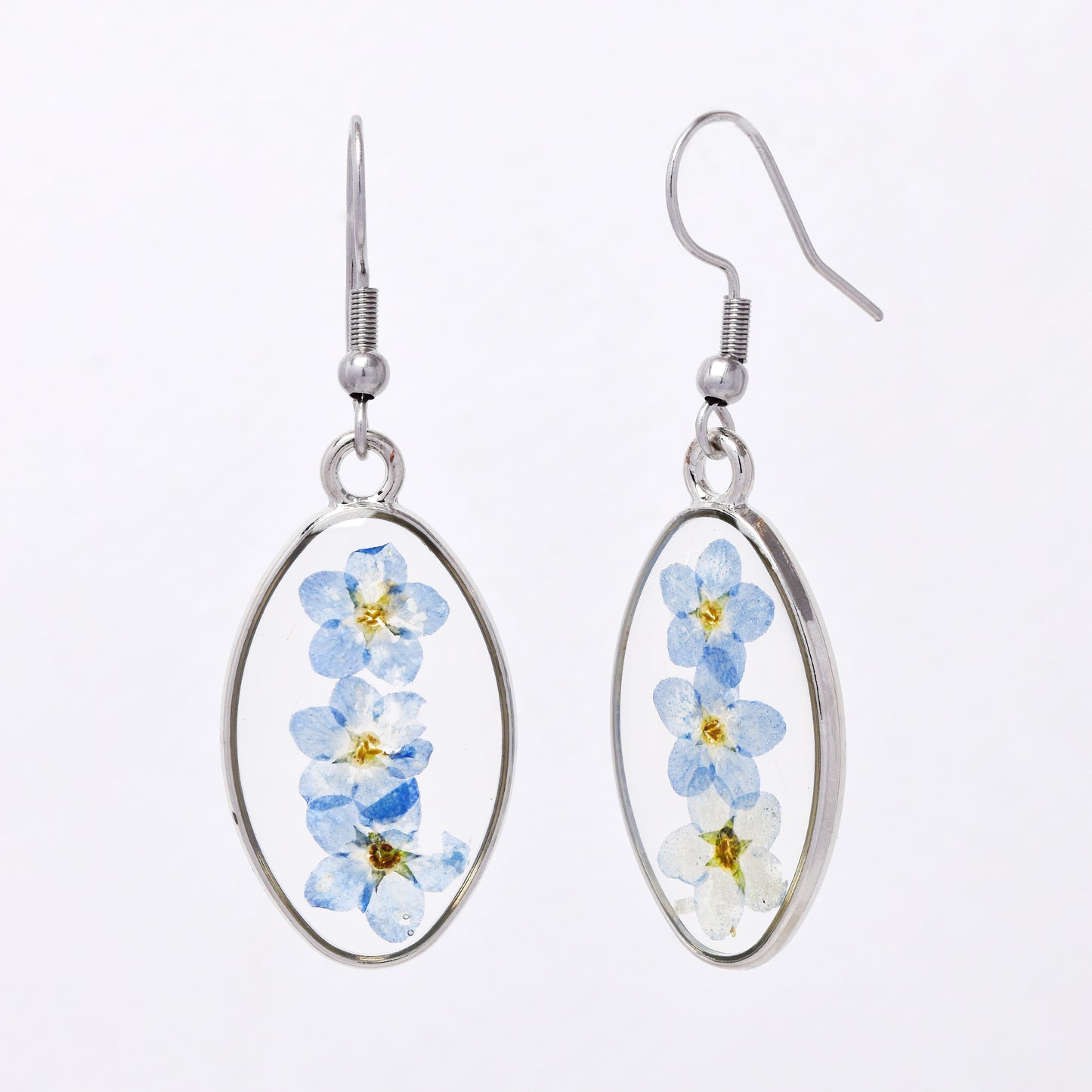 SSYE7432 - Steel 29mm x 17mm oval floral resin drop earring