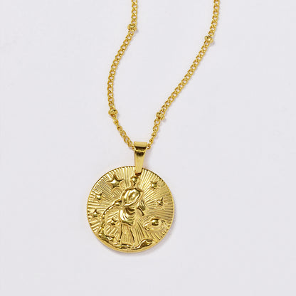 Stainless steel gold plated necklace with zodiac sign on round disc