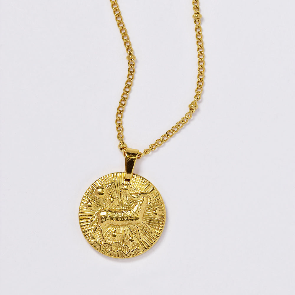 Stainless steel gold plated necklace with zodiac sign on round disc