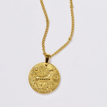Stainless steel gold plated necklace with zodiac sign on round disc - SSYN4990