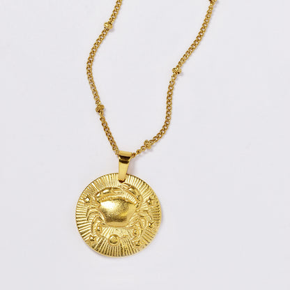 Stainless steel gold plated necklace with zodiac sign on round disc - SSYN4990