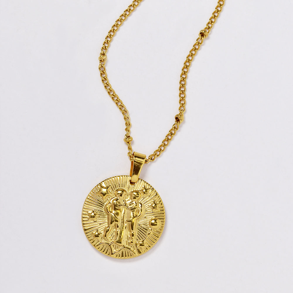 Stainless steel gold plated necklace with zodiac sign on round disc