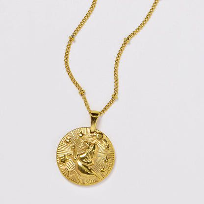 Stainless steel gold plated necklace with zodiac sign on round disc - SSYN4990