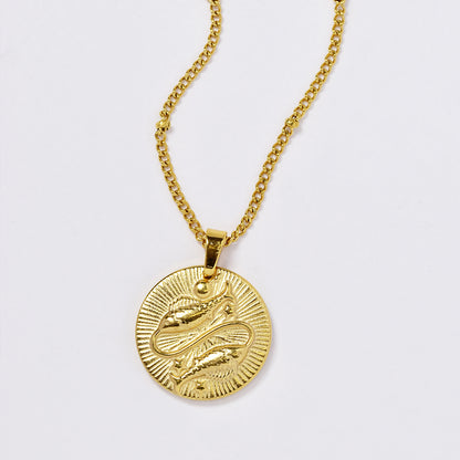 Stainless steel gold plated necklace with zodiac sign on round disc