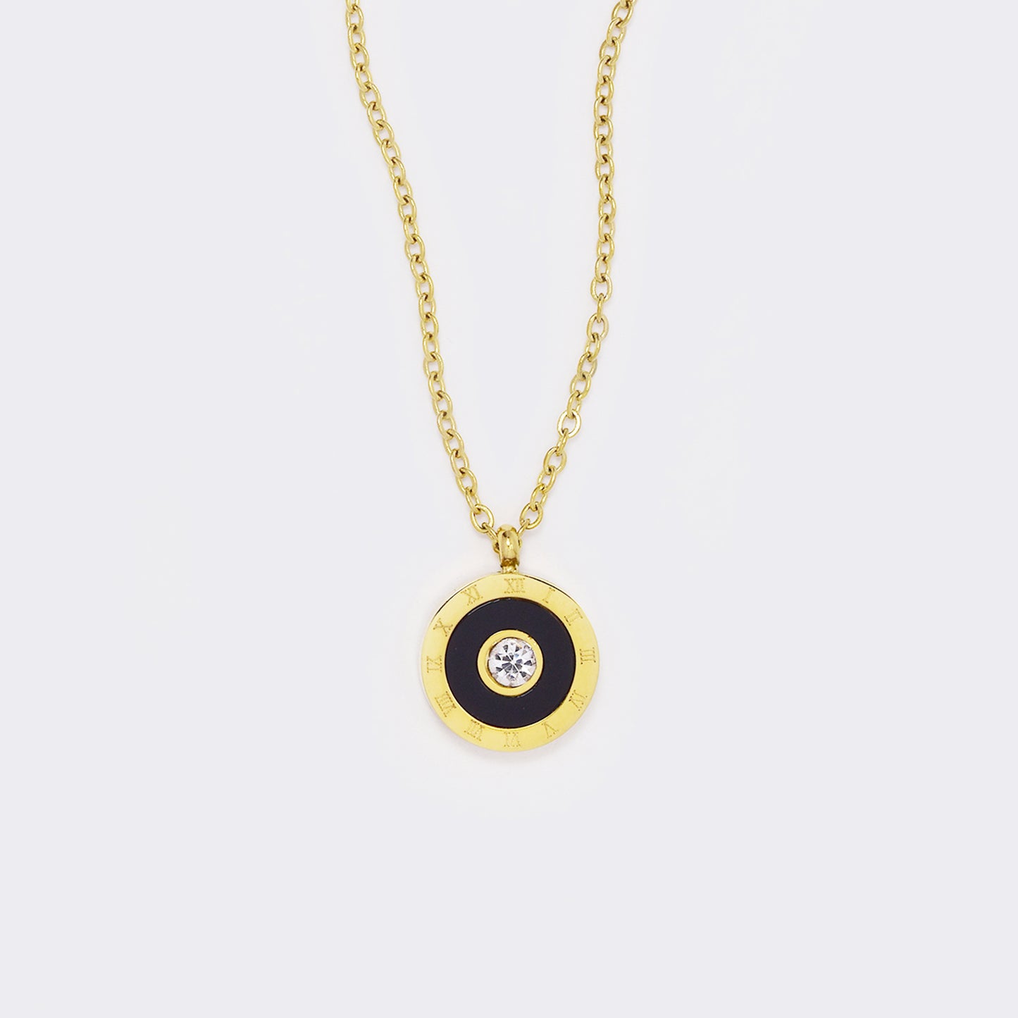 Steel gold and black round pendant with Roman numerals and cubic zirconia center