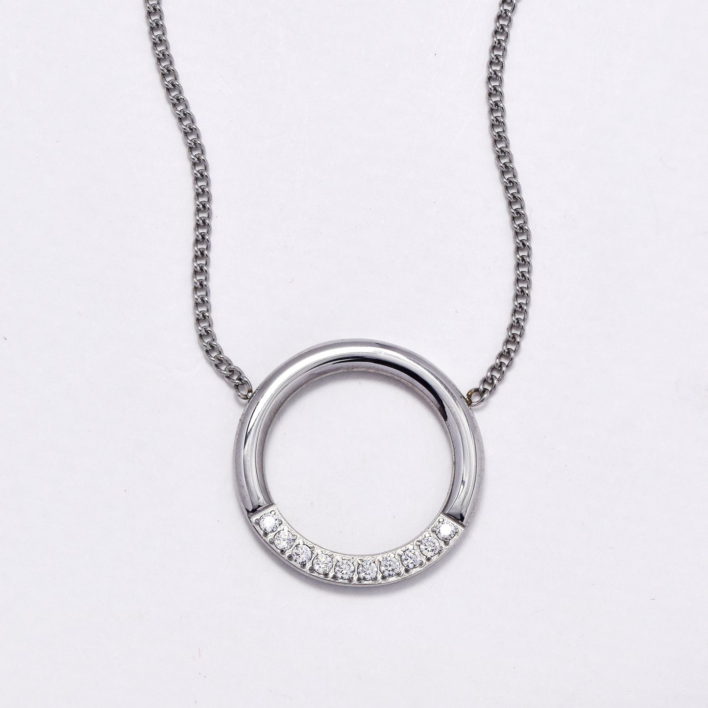SSYN6029 - St Steel 41cm + 10cm cutout circle CZ necklace