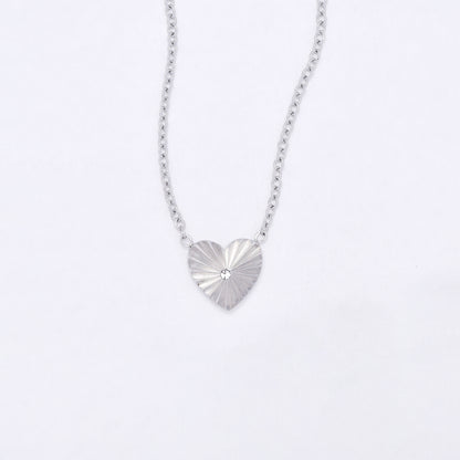 SSYN7110 - Steel 42cm + 5cm sunray CZ heart necklace