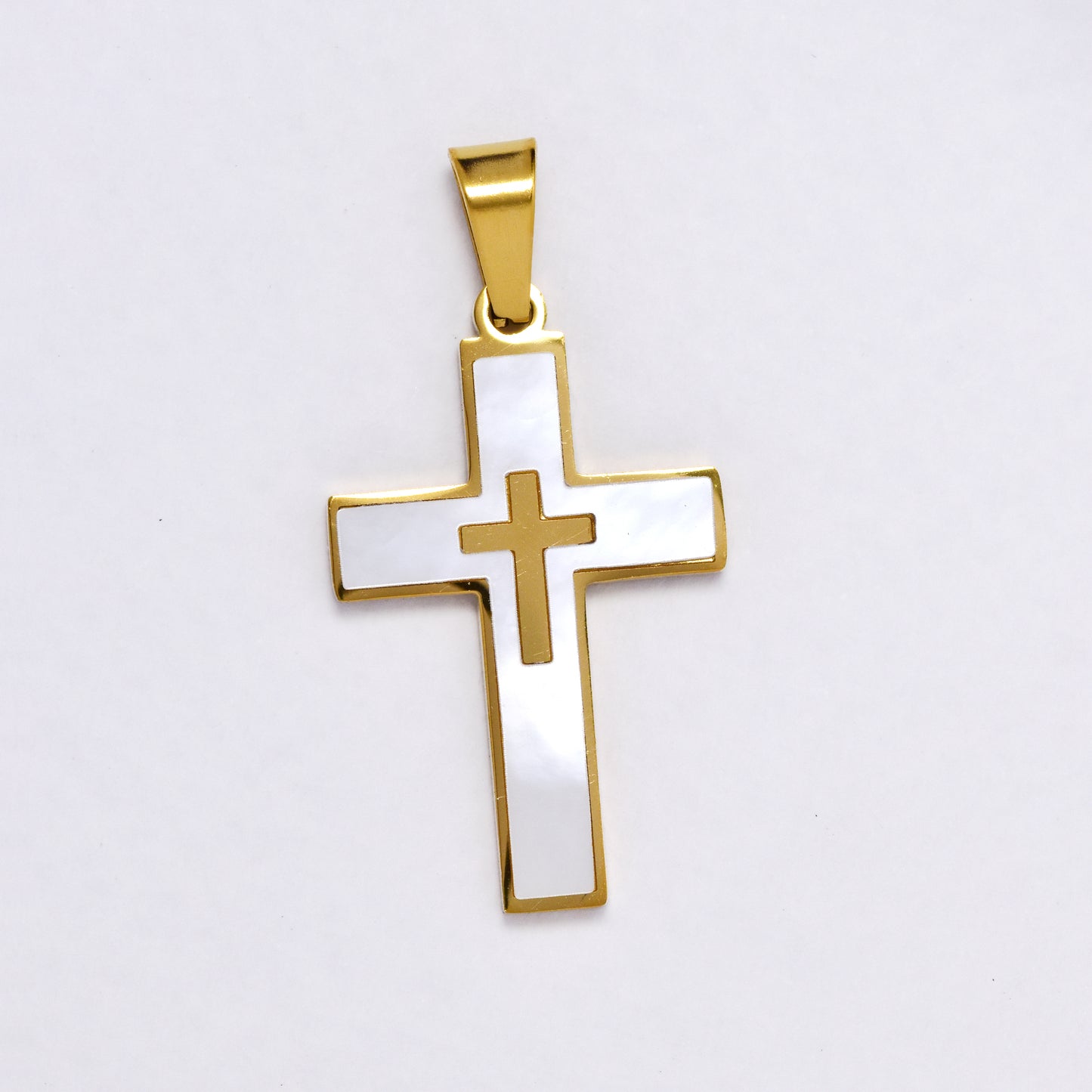 SSYP6855 - Steel 28mm x 18mm mother of pearl cross pendant