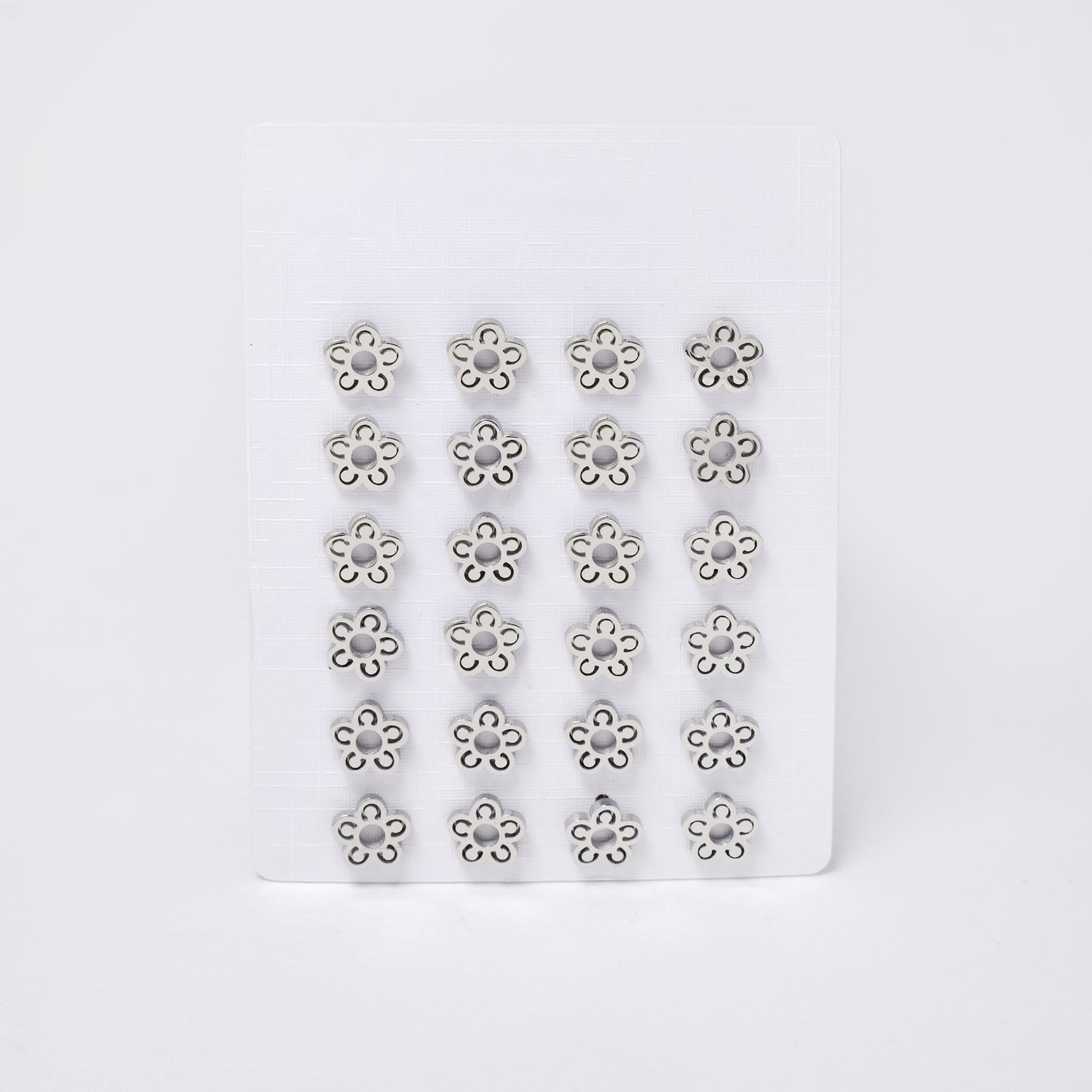 SSYPK7377 - Steel 12 pack flower stud earrings