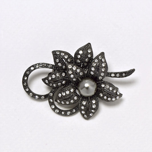 Gunmetal crystal flower brooch with pearl centre