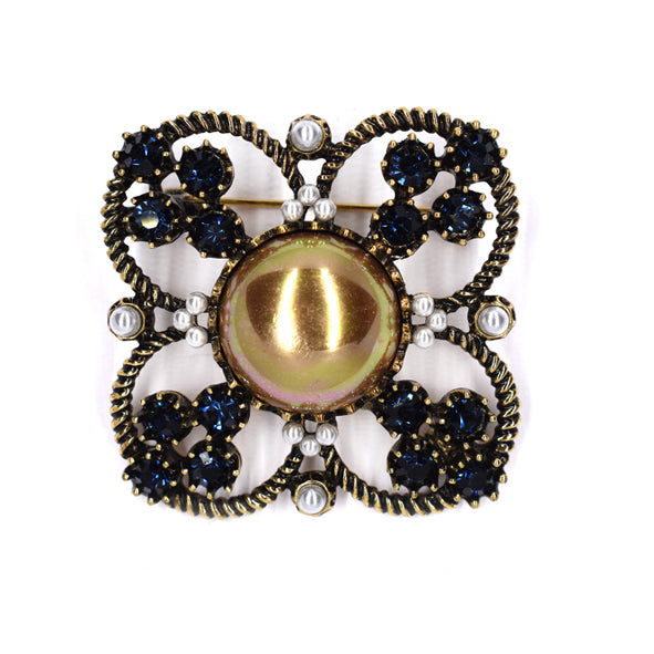 Antique gold clover brooch with blue crystals and champagne brown centre pearl