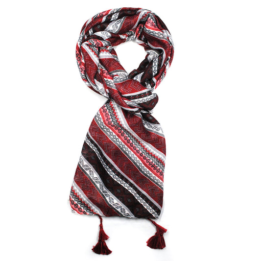 Multi print and linear design scarf with tassel in each corner.