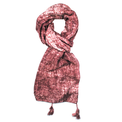 Mottled finish pattern scarf with tassels in each corner of the scarf