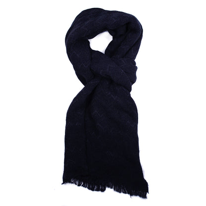 Zigzag pattern scarf with a fringe all the way around the scarf.