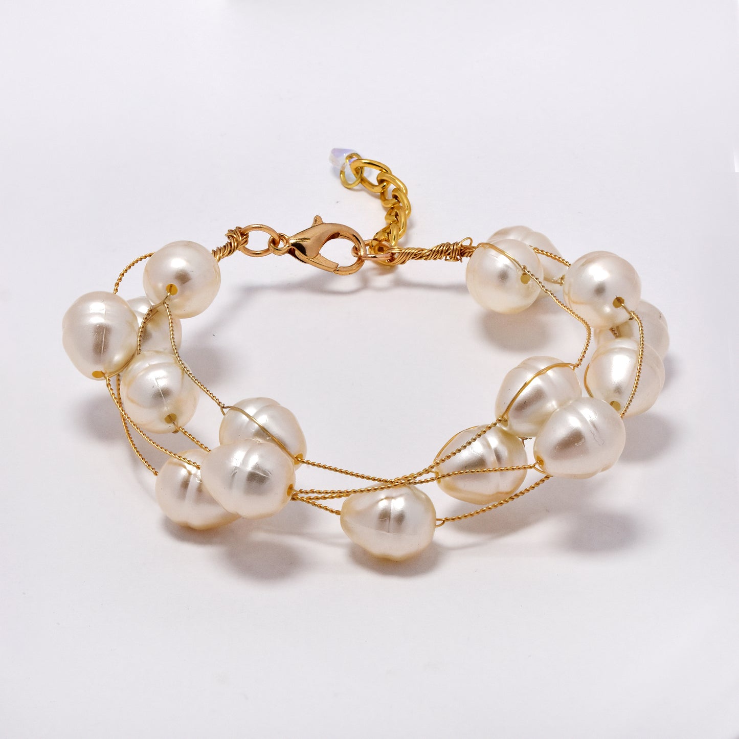 Intertwined multi strand teardrop shaped faux pearl bracelet - YB5298