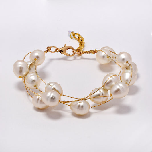 Intertwined multi strand teardrop shaped faux pearl bracelet - YB5298