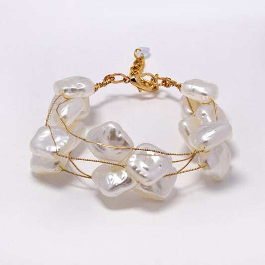 Intertwined multi strand organic square shaped faux pearl bracelet - YB5300