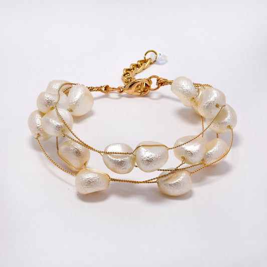 Intertwined multi strand textured faux pearl bracelet - YB5303