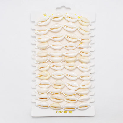 YB6771 - 12 Pack adjustable cowrie shell bracelet