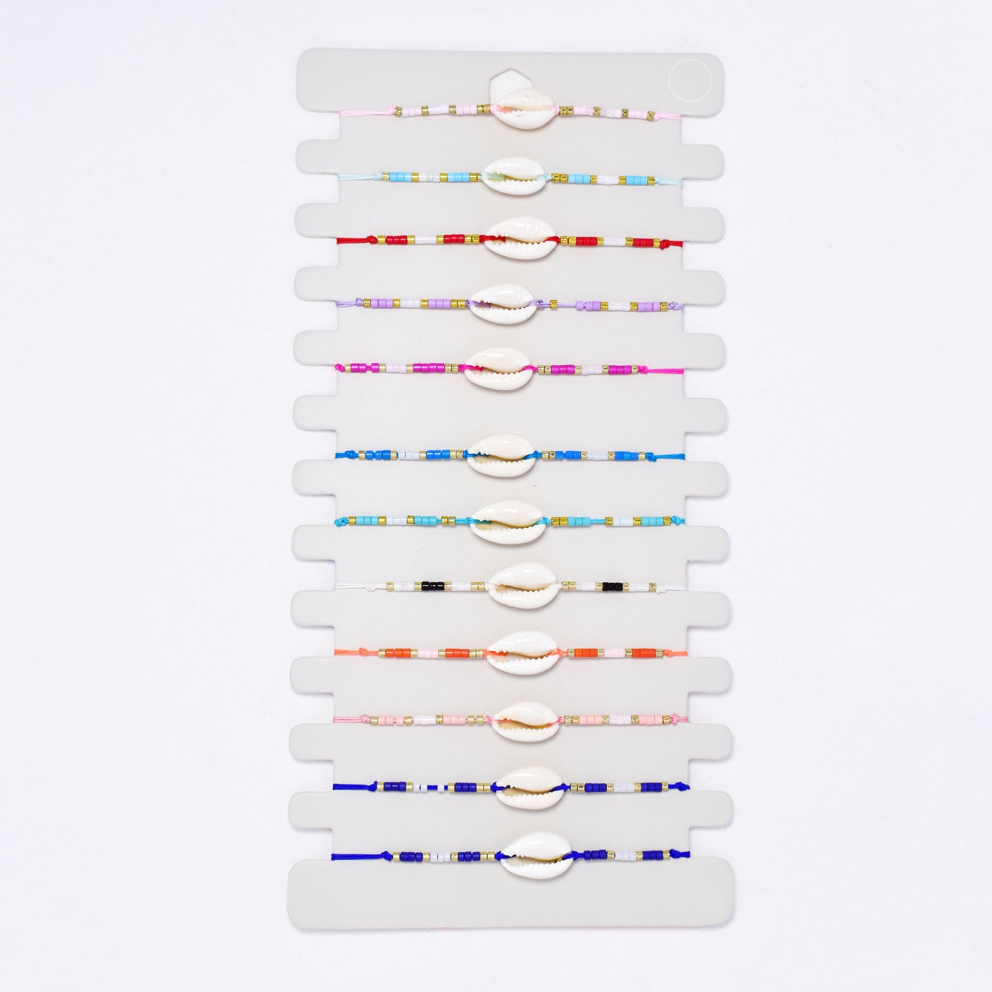 YB7540 - 12 Pack adjustable shell & bead bracelet