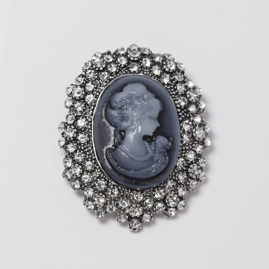 Fashion cameo brooch grey with diamante